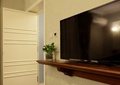 客厅,电视,电视柜,植物,门