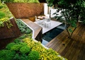 木板铺装,坐凳,桌椅组合,绿植,景墙
